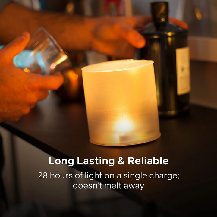 Candle-like light source on a table with text about its long-lasting and reliable properties.