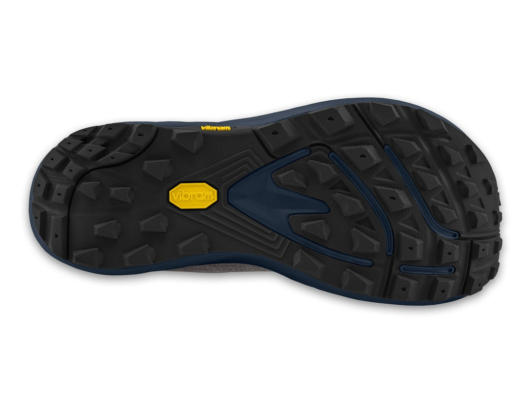 Close-up of a black and blue sole with a brand logo on a white background