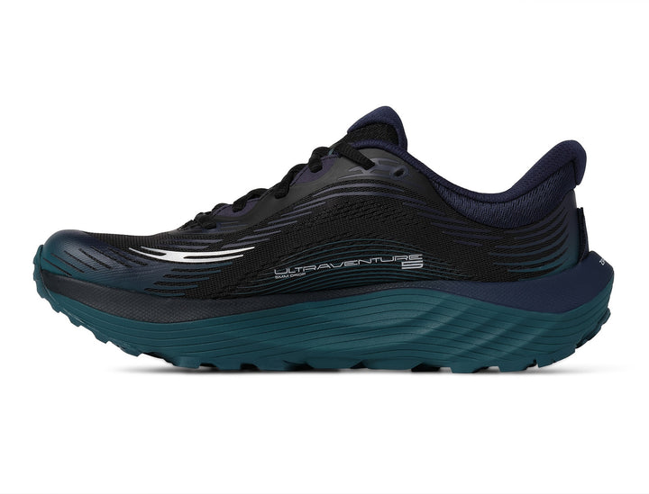 Black and teal running shoe on a white background