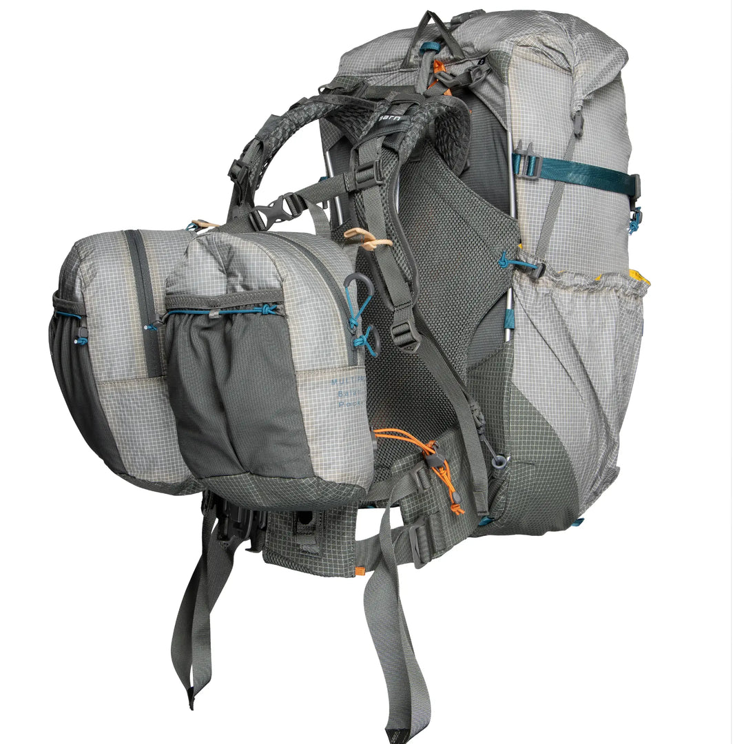 Gray hiking backpack with multiple compartments and straps on a white background