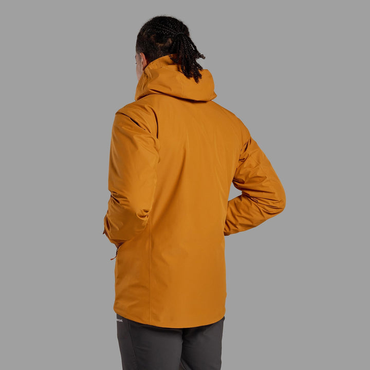 Person wearing an orange raincoat and facing away from the camera on a grey background