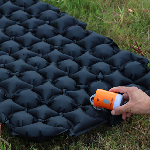 Air pump being used to inflate mattress