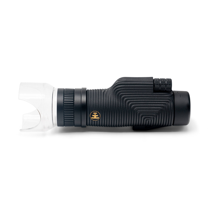 Black monocular telescope on a white background