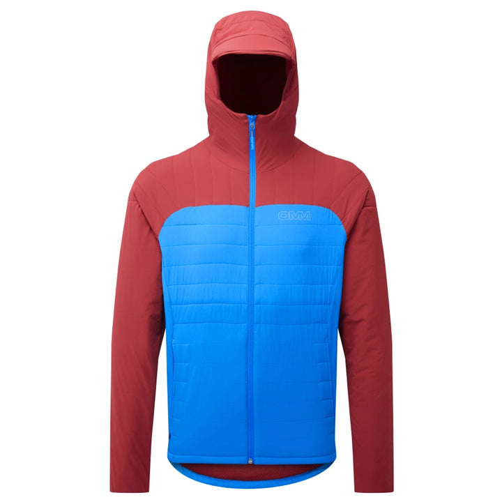 OMM Mountain Core Jacket in Blue/Dark Red, worn on the mountain