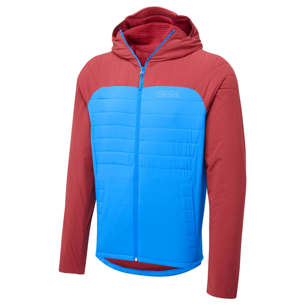 OMM Mountain Core Jacket in Blue/Dark Red, lifestyle shot showing the lined hood