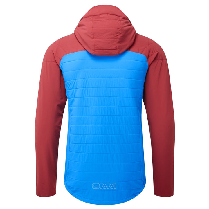 OMM Mountain Core Jacket in Blue/Dark Red, lifestyle shot on the move