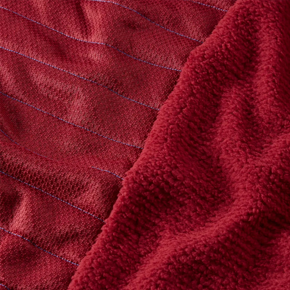 OMM Mountain Core Jacket in Blue/Dark Red, lifestyle shot