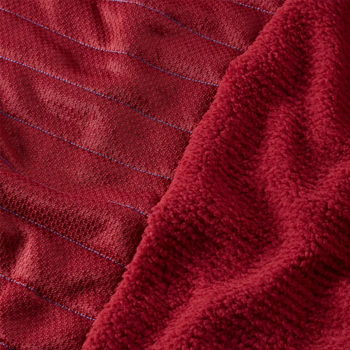 OMM Mountain Core Jacket in Blue/Dark Red, lifestyle shot