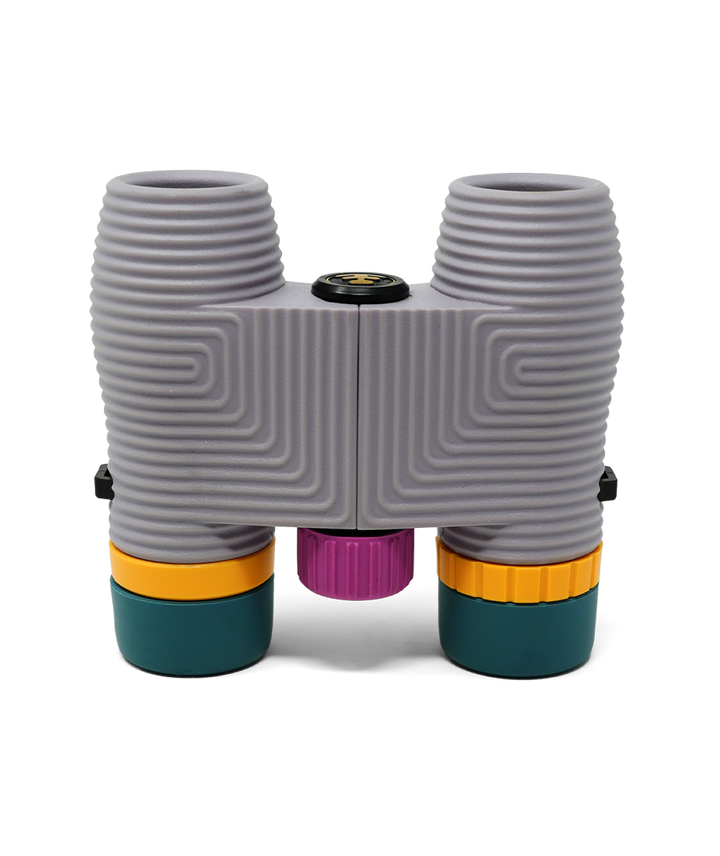 Lavender coloured compact binoculars viewed from above