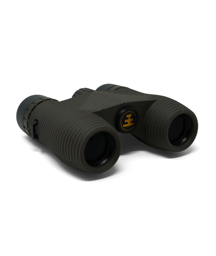 Compact dark grey binoculars on a white background