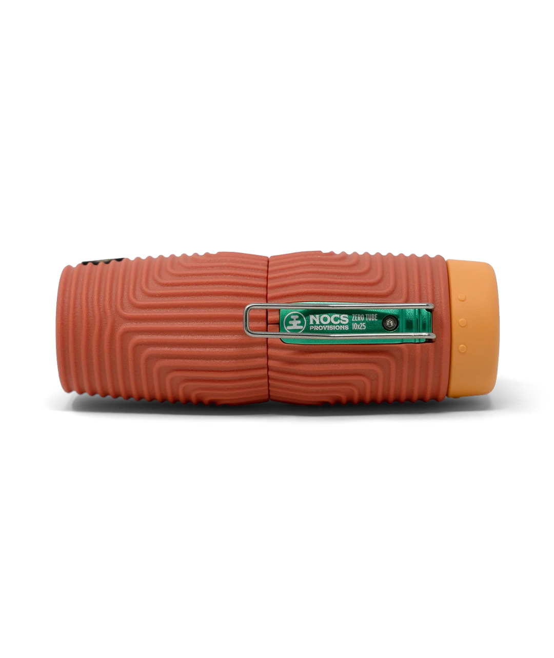 A terracotta coloured textured monocular with a light orange end cap and a silver metal clip over a green Nocs brand logo, shown on a white background.