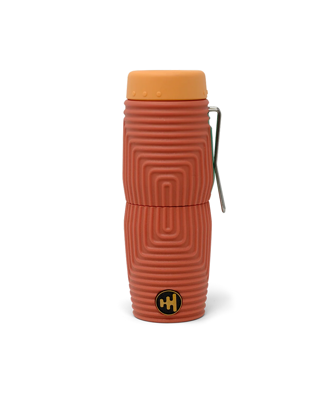 A terracotta coloured textured monocular with a light orange end cap and a silver metal clip over a green Nocs brand logo, shown on a white background.
