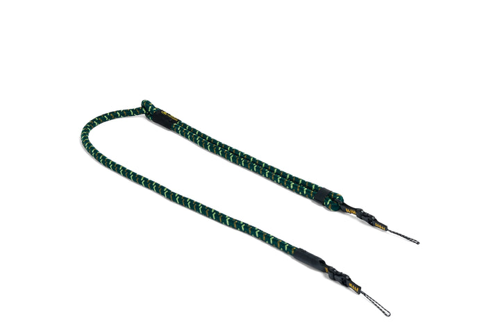 Green and black rope strap on a white background