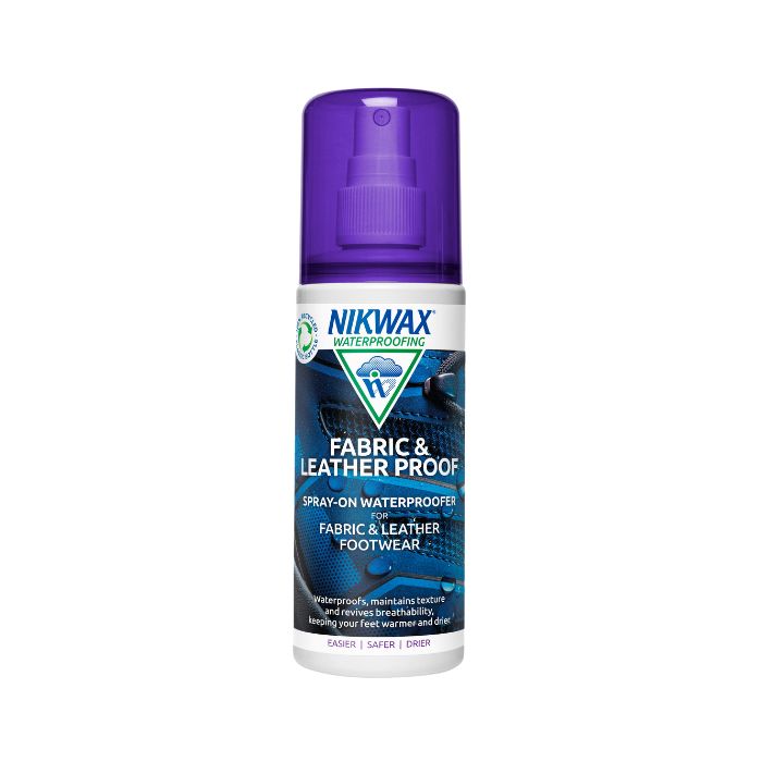 A spray bottle of Nikwax Fabric &amp; Leather Proof Spray with a purple cap.