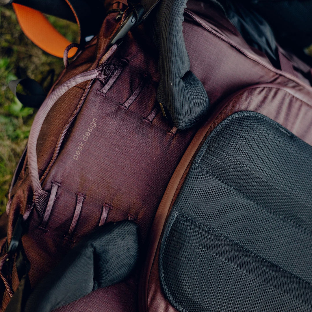 Close-up of a brown backpack with &