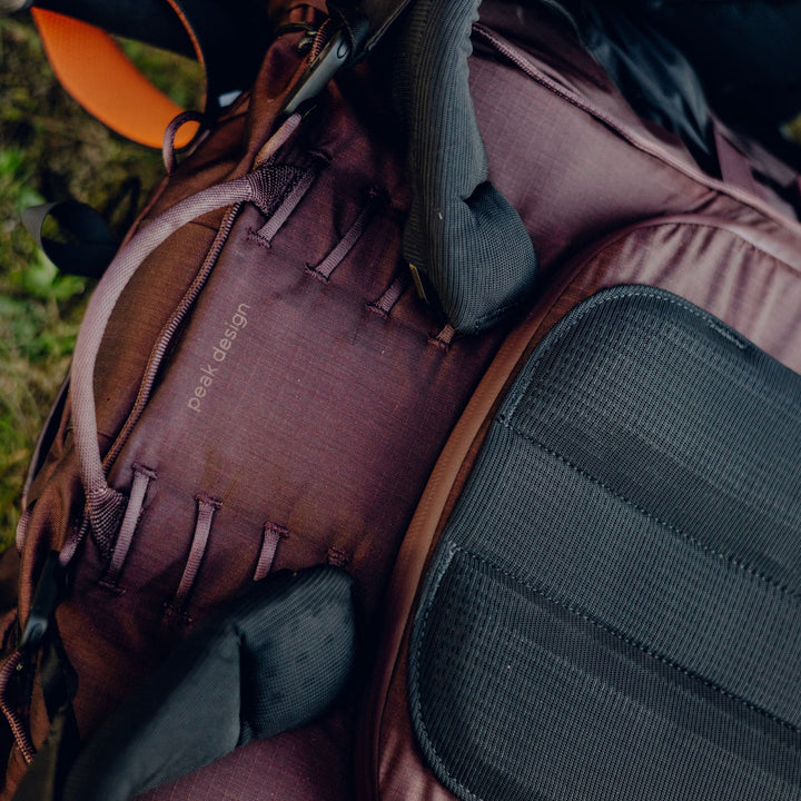 Close-up of a brown backpack with &