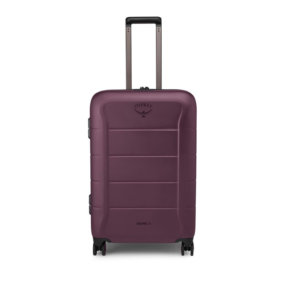 A hard-shell spinner suitcase in a deep plum purple color, featuring a telescoping handle extended upwards and the Osprey logo on the front, set against a plain white background.
