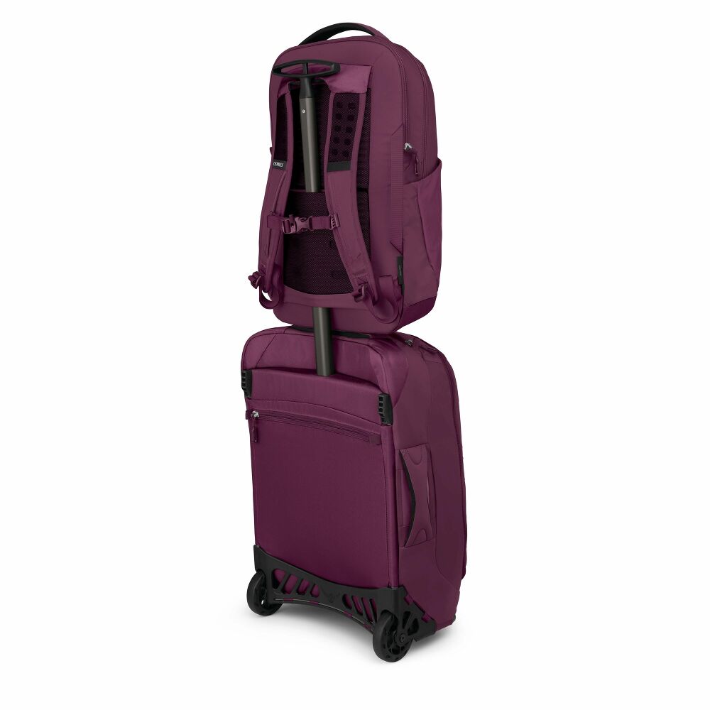 Purple suitcase and backpack set on a white background
