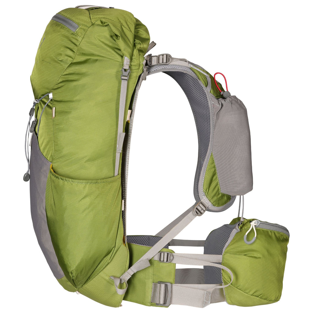 Green hiking pack viewed in profile on a white background