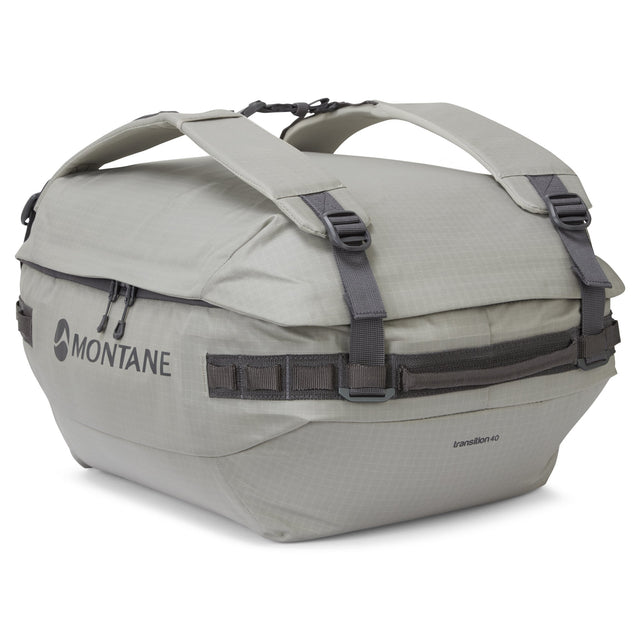 Grey duffel bag with Montane logo on a white background