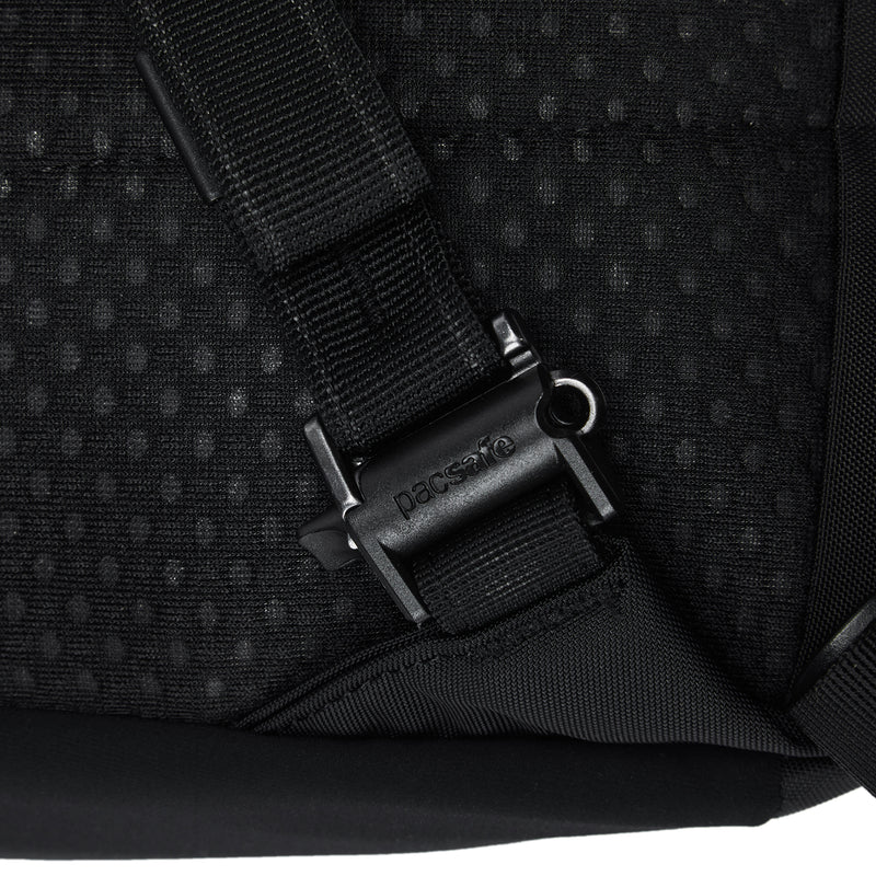Close-up of a black backpack with a visible brand logo on a white background