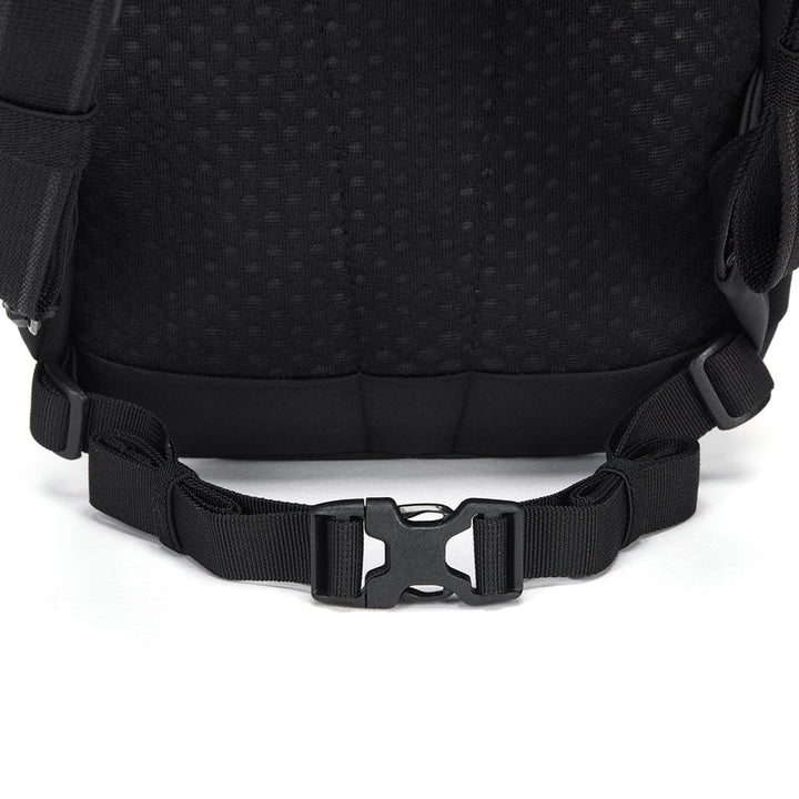 Close-up of a black backpack strap with a buckle on a white background