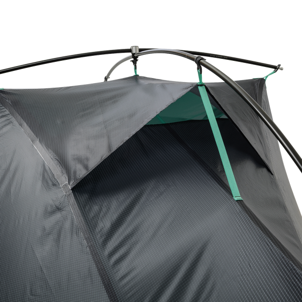 Close up of air vent of dark grey and green tent.