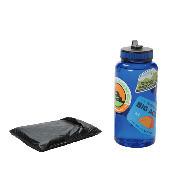 Black footprint in bag next to blue water bottle.