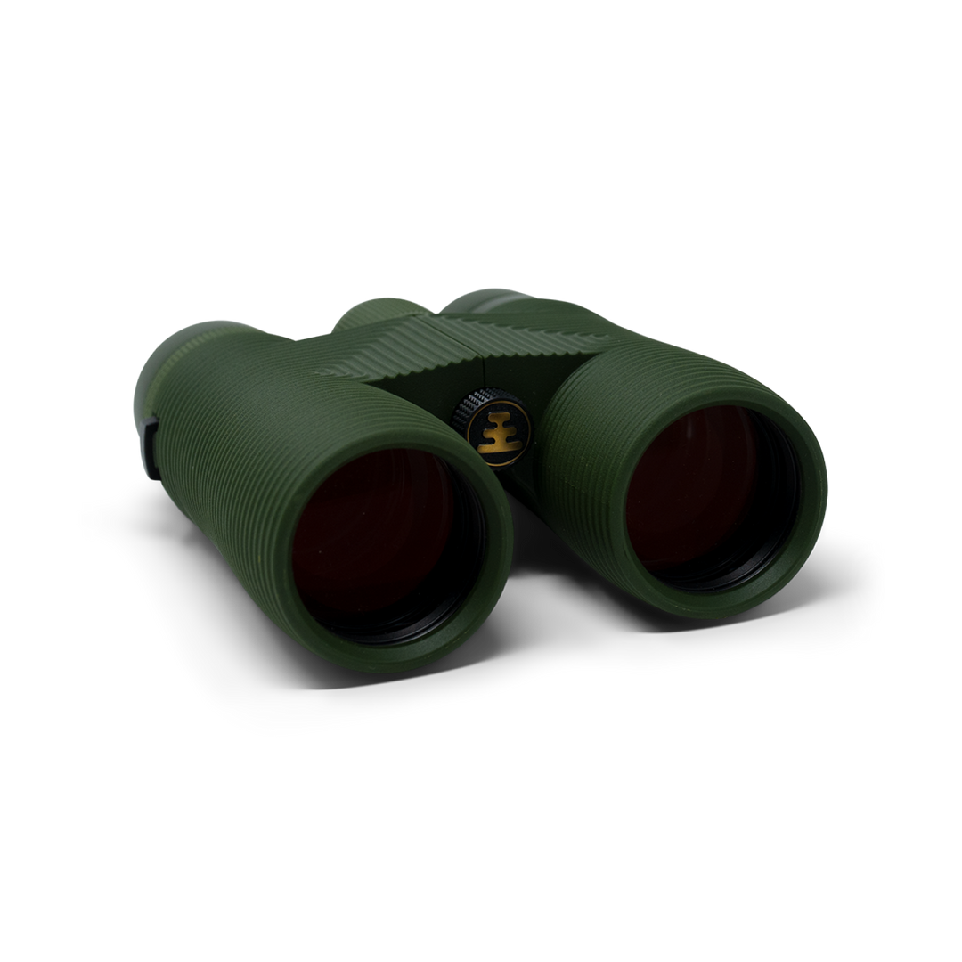 Green binoculars on a white background