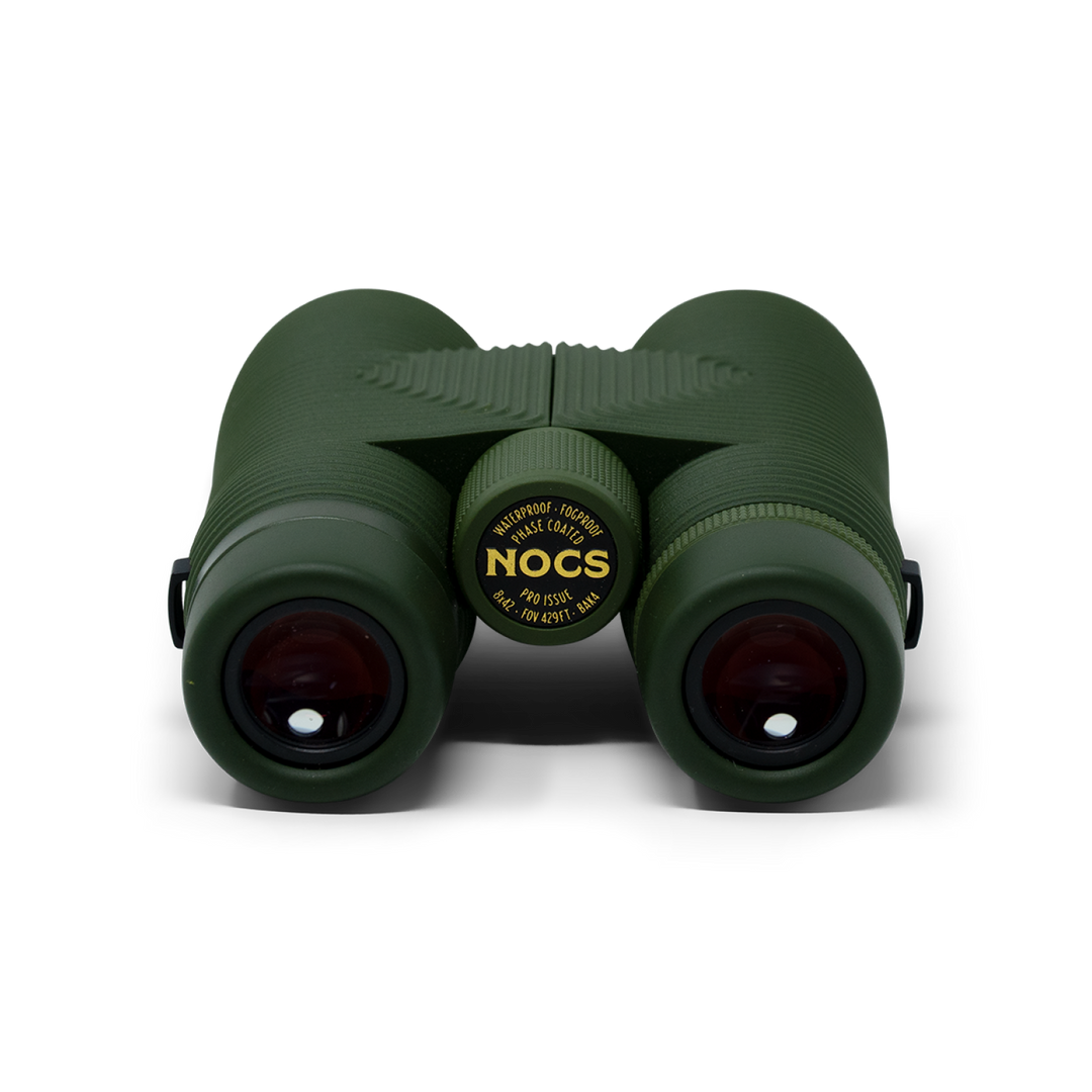 Green binoculars with 'Nocs' branding on a white background
