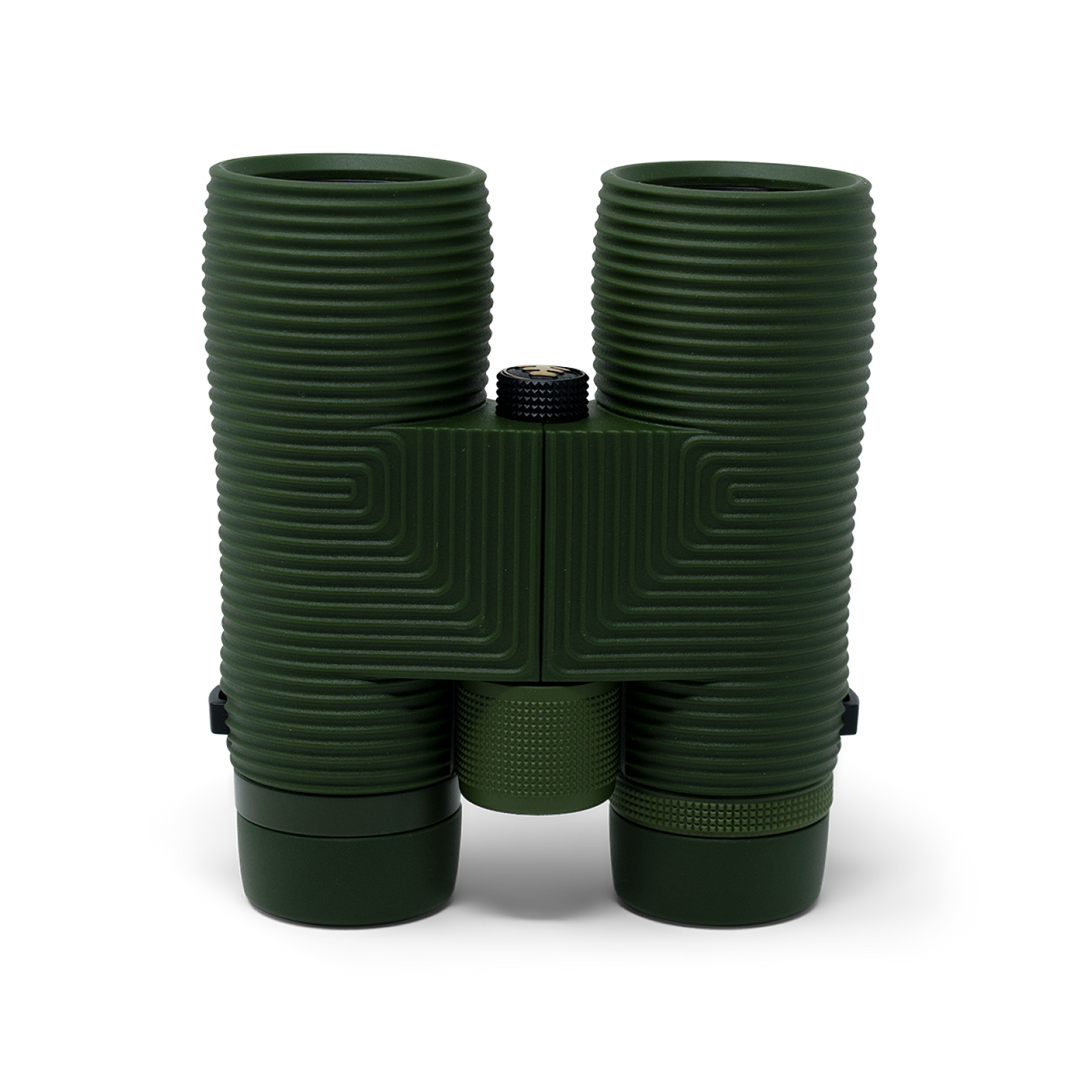 Green binoculars on a white background