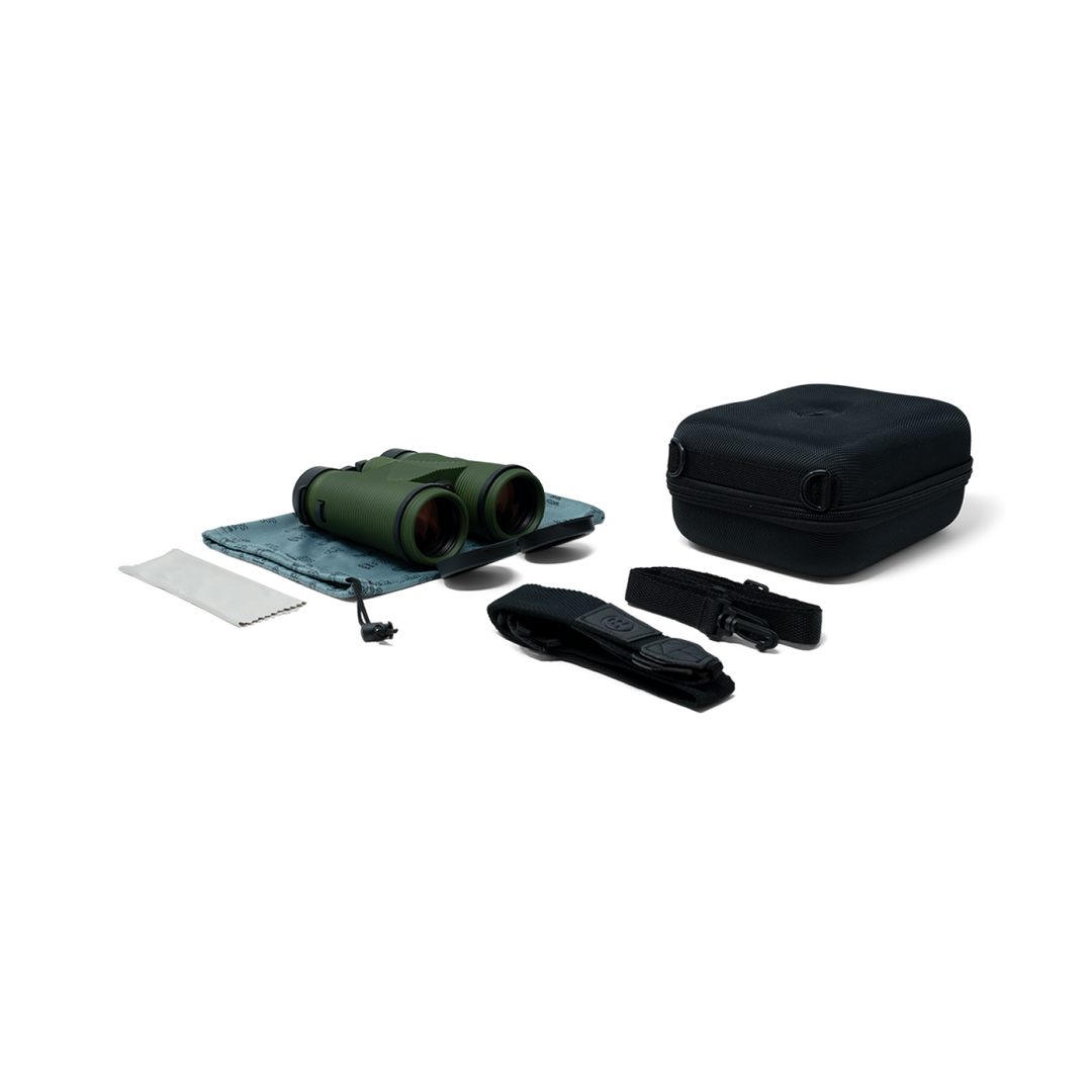 Binoculars with carrying case and accessories on a white background