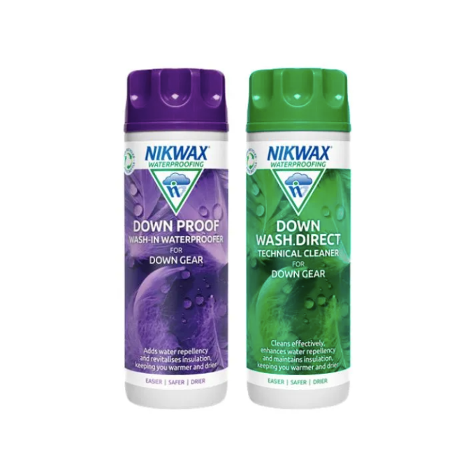 Two bottles of Nikwax laundry products for down wash and proofing, with purple (down proofing product) and green (down wash direct product) labeling respectively, against a white background.