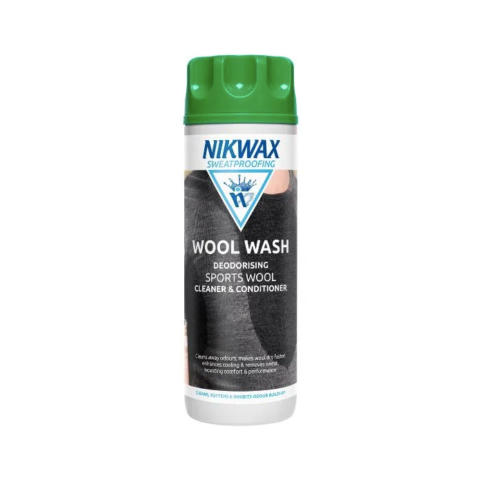 A bottle of Nikwax Wool Wash with a green cap on a plain background.