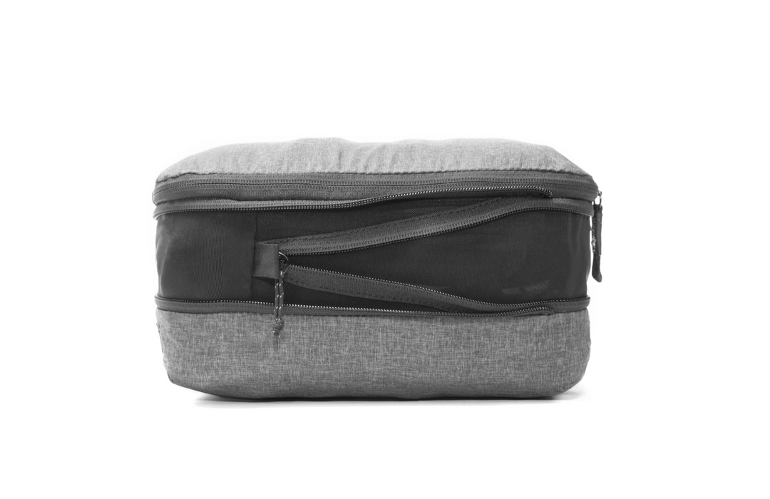 A gray and black zippered travel pouch or organizer bag shown from the front on a plain white background.