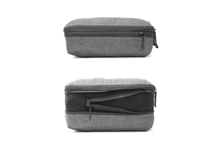 A gray heathered rectangular zippered pouch shown from two angles on a white background, with a top view above and a side/front view below.
