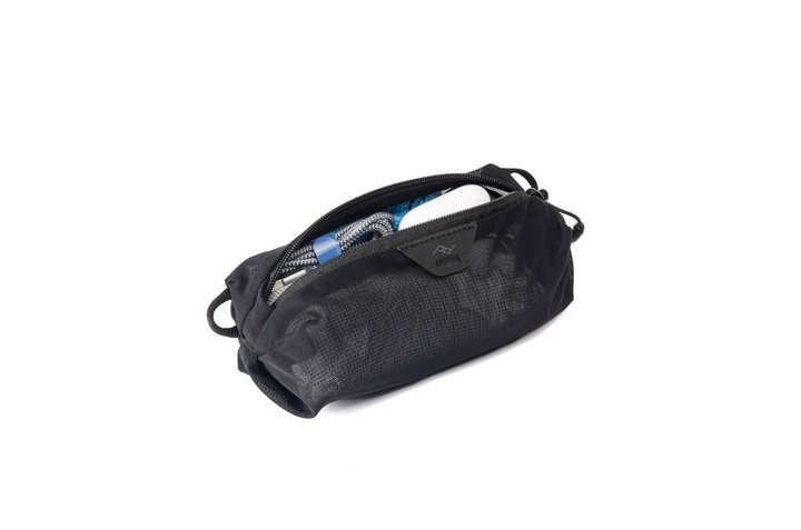 Extra Small black mesh packing cube on a white background 