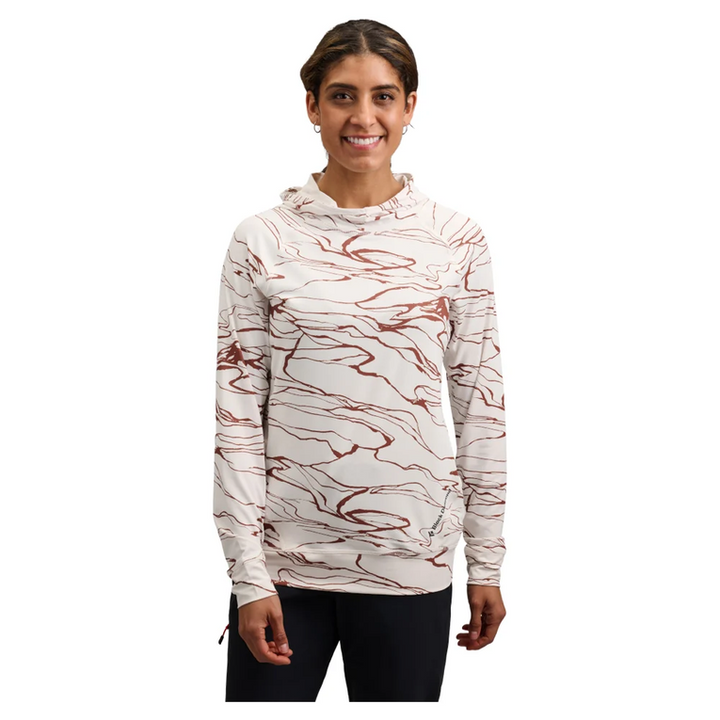 Woman wearing a white hoodie with red and brown abstract pattern on a white background