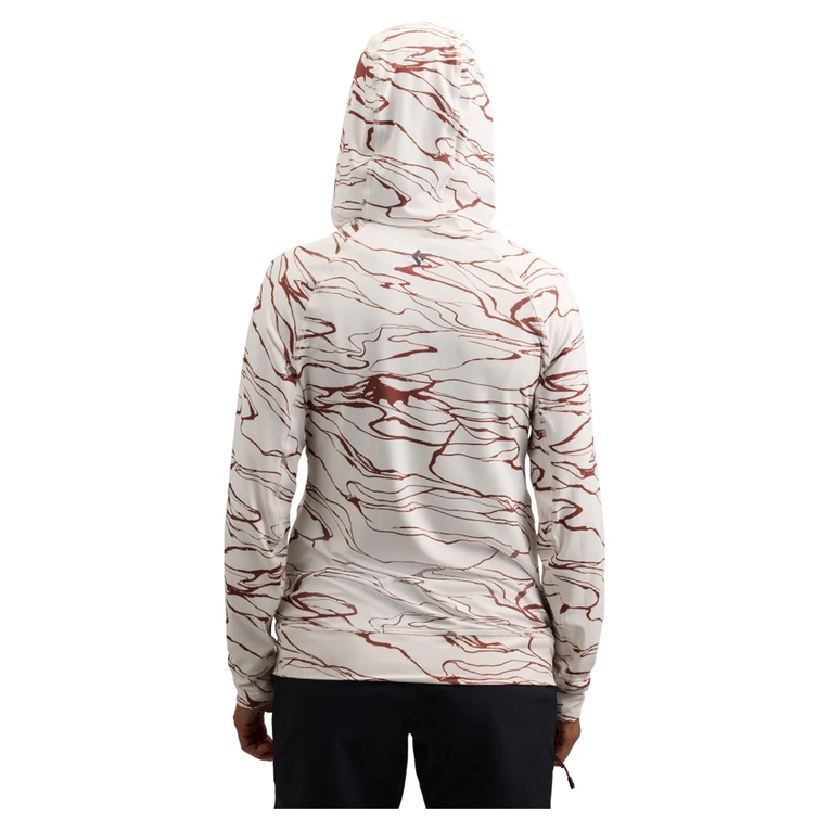 A person shown from the back wearing a hooded long-sleeve top with an abstract marbled pattern in reddish brown and off-white, paired with dark bottoms, on a plain white background.