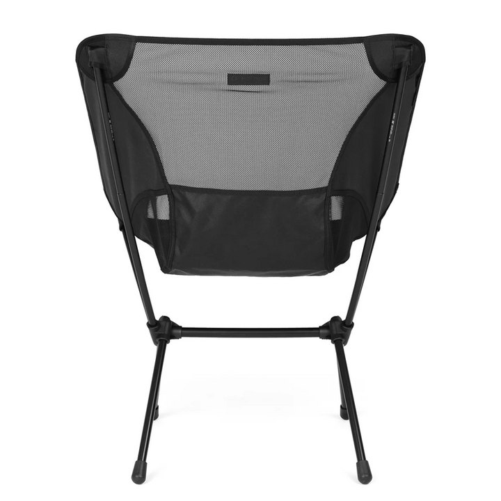 A black and gray folding camp chair with a mesh backrest and a black storage pocket on the front, shown on a solid white background.