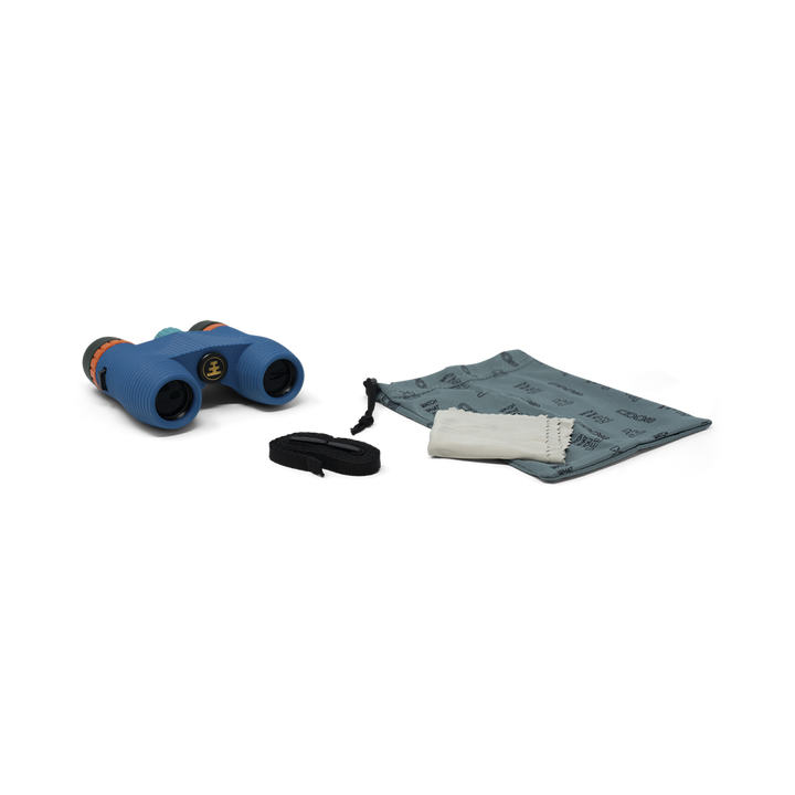Blue binoculars with carrying strap, carry bag, and cleaning cloth on a white background
