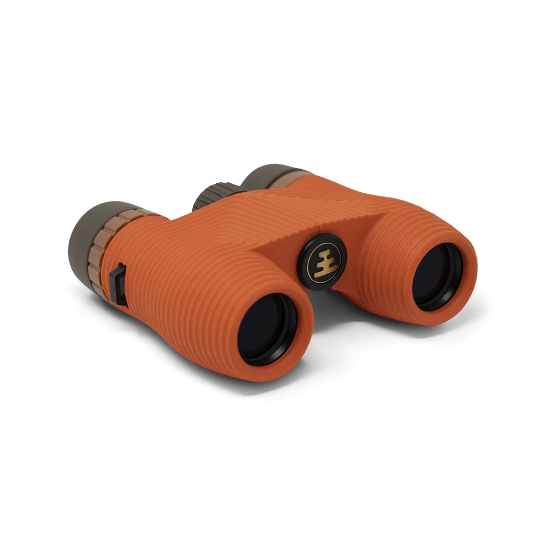 Orange binoculars with a brand logo on a white background