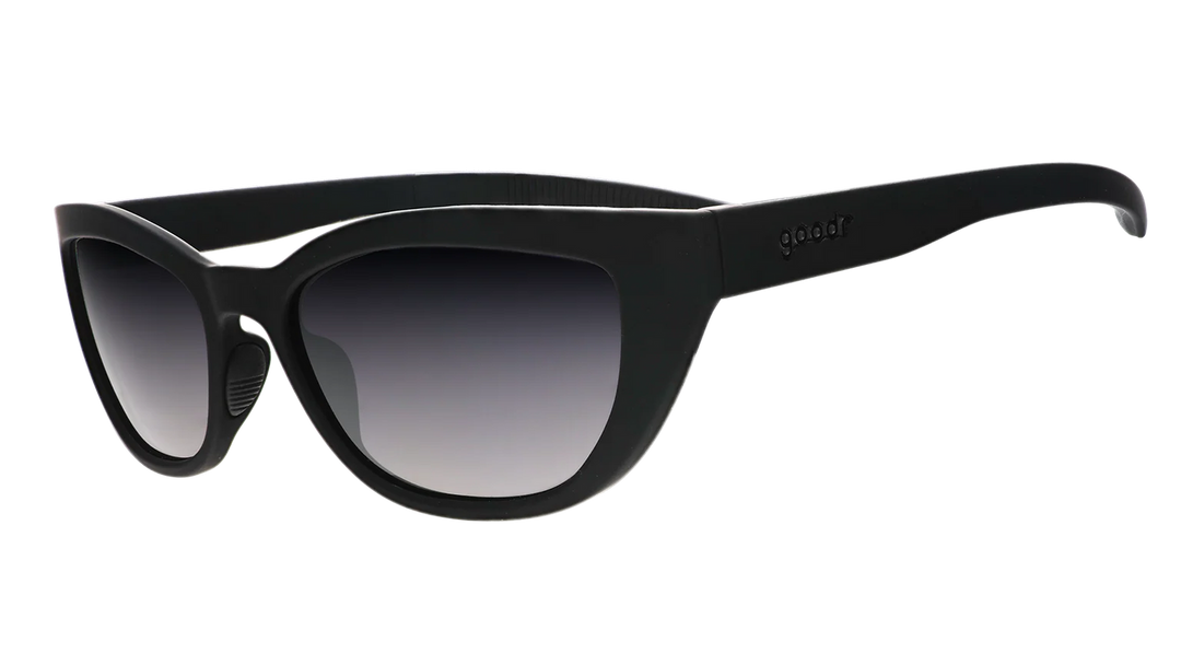Black sunglasses with gradient lenses on a white background