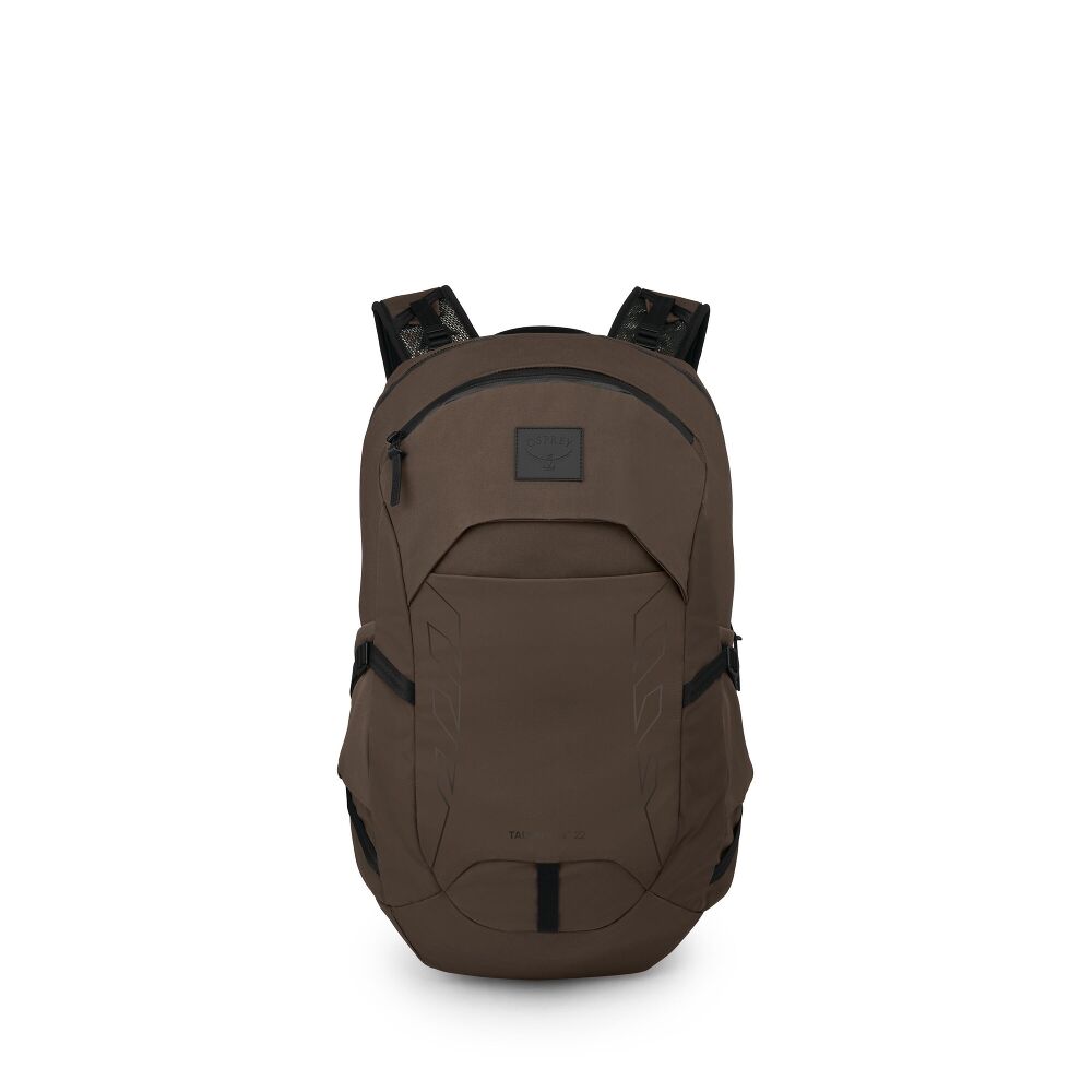 An olive green backpack with black accents, including the shoulder straps and a small square logo patch on the front, shown against a plain white background.