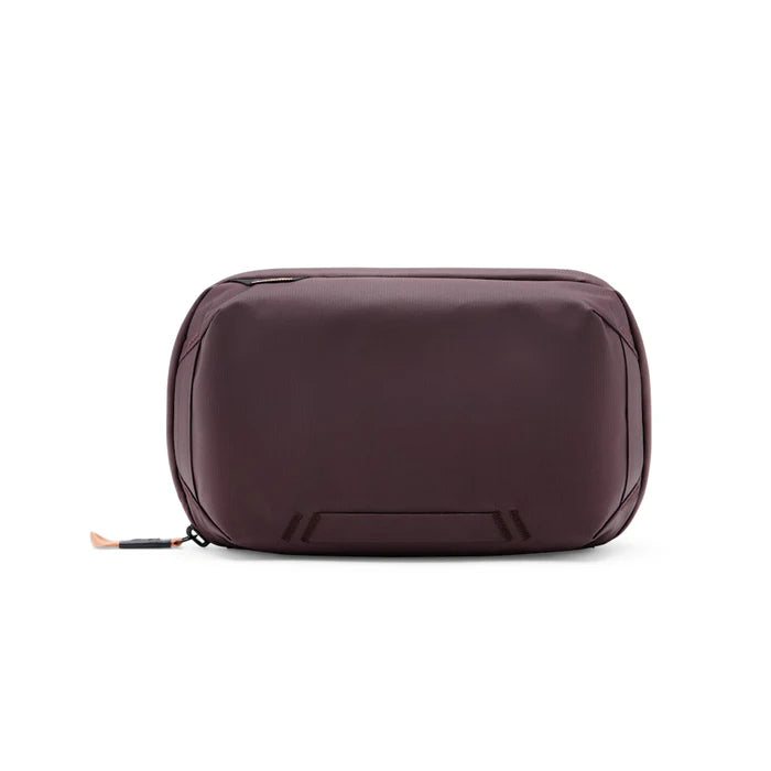 Brown toiletry bag on a white background