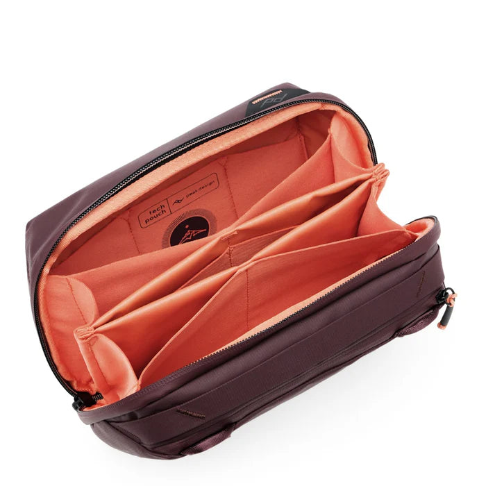 Open brown bag with orange interior on a white background