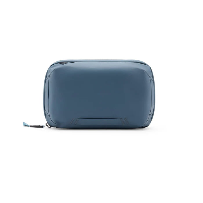 A blue zippered toiletry bag with a matte finish, shown from the front on a plain white background.