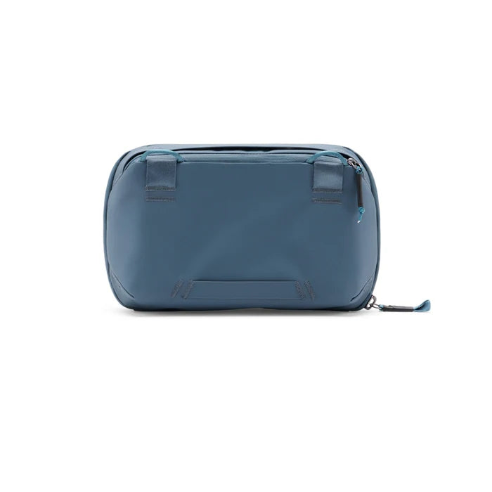 Blue toiletry bag on a white background