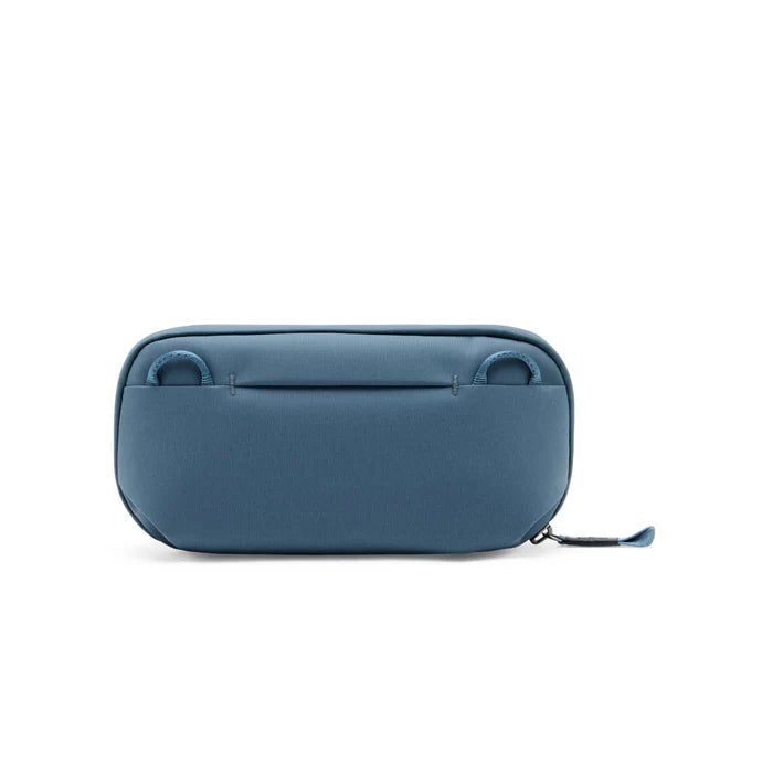 Blue accessory pouch with brand logo on a white background