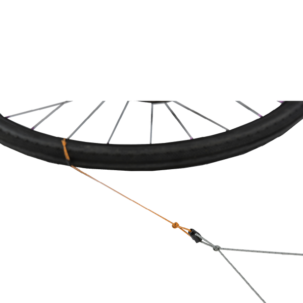 Bicycle with tent guyline tied to it